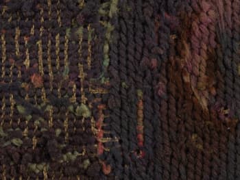 Close up of the front of Lillian White's, embroidery sampler. 