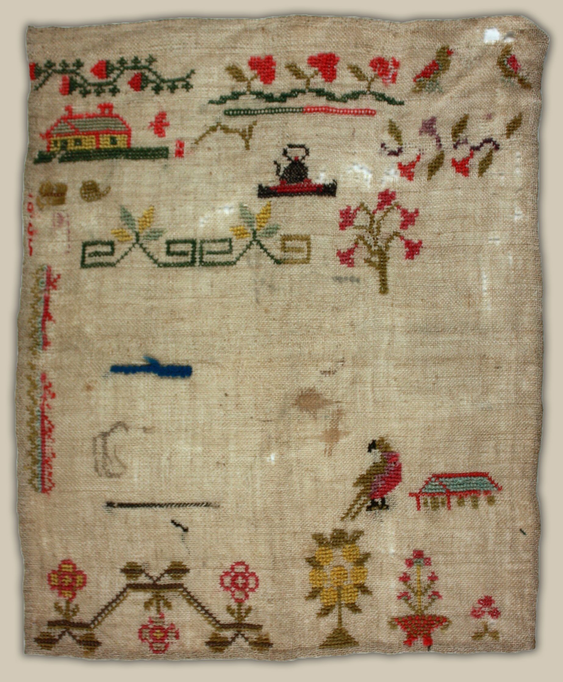 Sampler by the Winter Sisters with decorative motifs and borders, Melbourne. Circa 1846-1853. Courtesy of Museums Victoria, HT 38903.