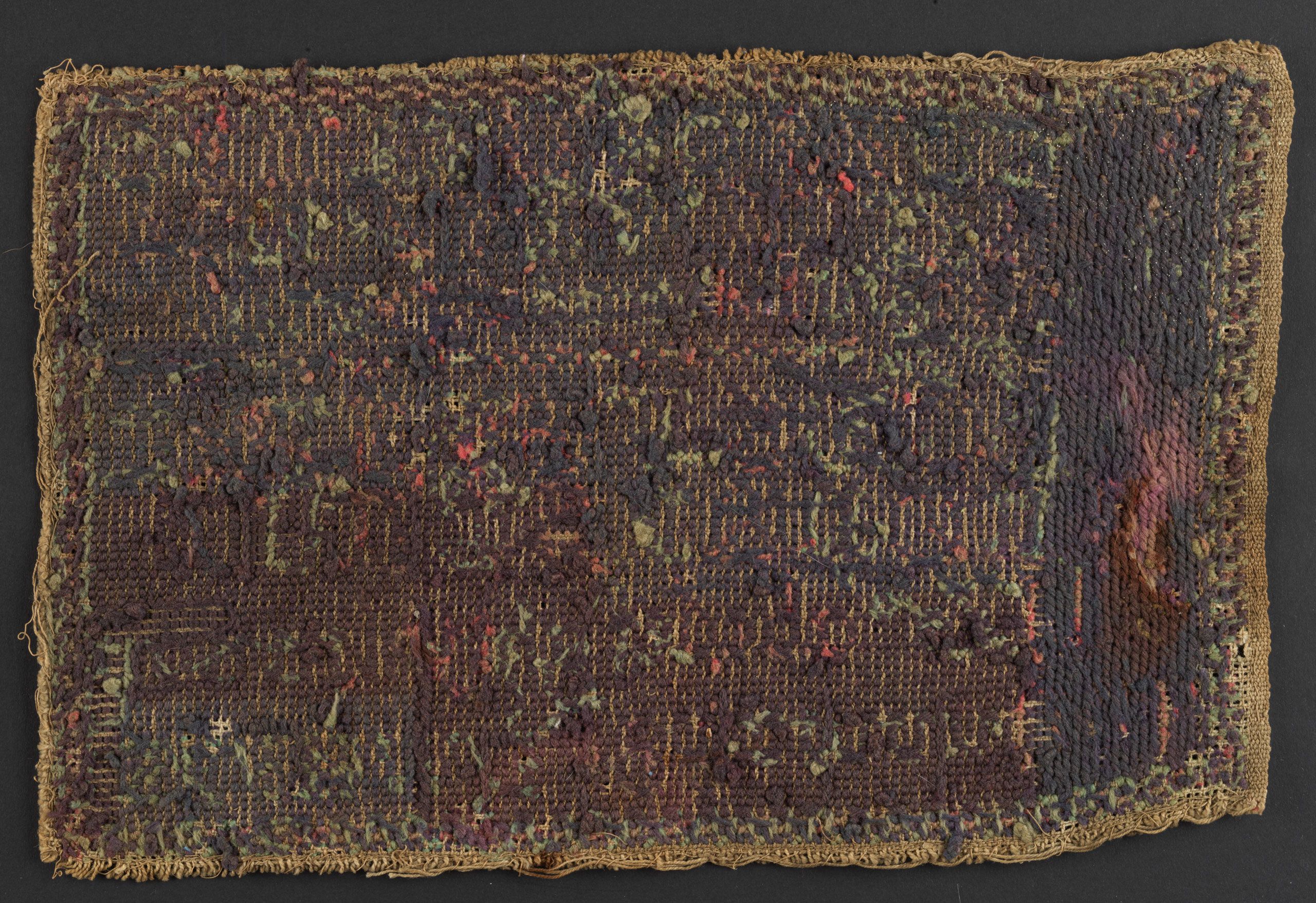 The back of Lillian White's, embroidery sampler. SLSA CLRC Toys Box 144