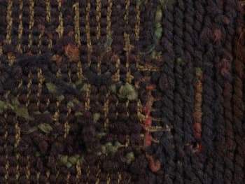 Close up of the back of  Lillian White's, embroidery sampler. SLSA CLRC Toys Box 144.