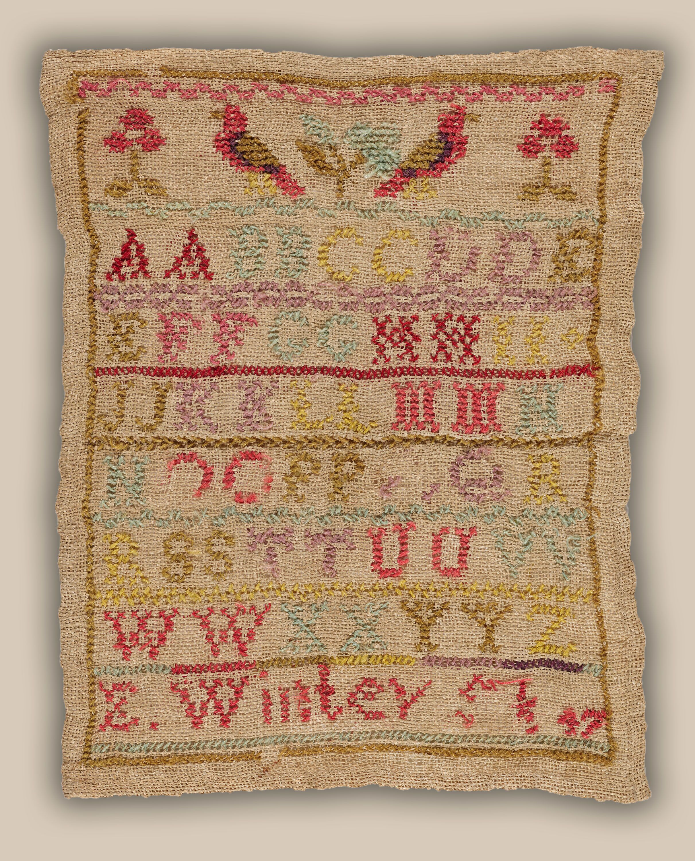 Sampler by Eliza Winter, Alphabet with Birds & Flowers, Melbourne, 1847. Courtesy of Museums Victoria, HT 38738.