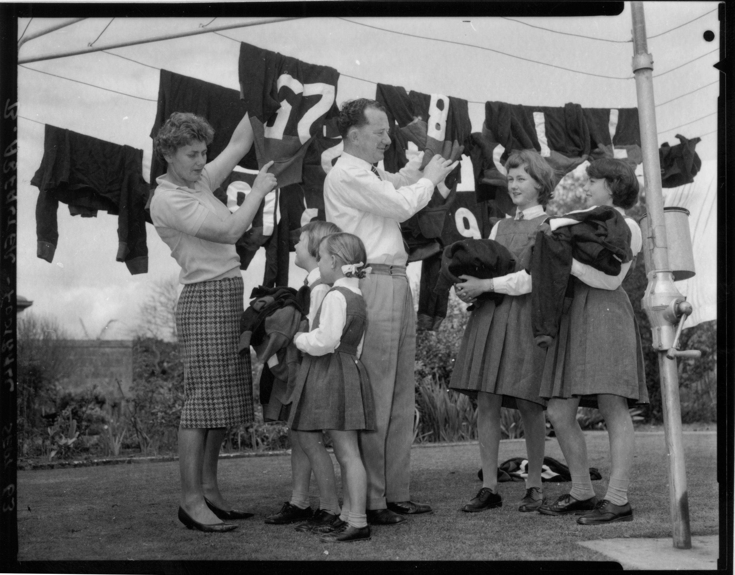 Abfalter family of Mount Gambier bringing in football team guernseys, 1963. Arthur Studios, photographer. SLSA: BRG 347/2293
