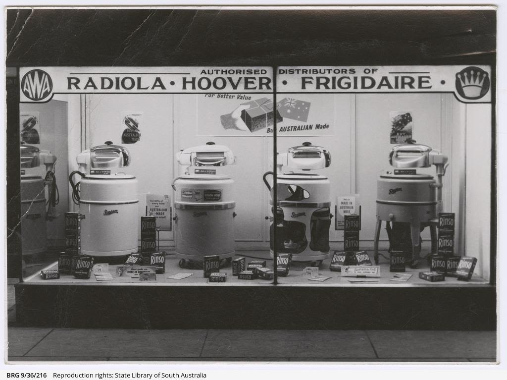 Simpson washers in display window of a store, circa 1950.