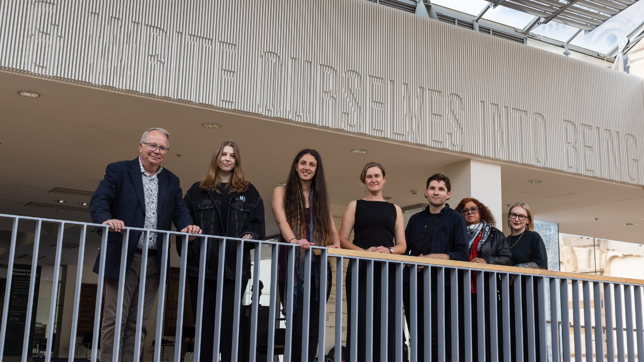 Former State Library Director Geoff Strempel and former Writers SA CEO Jessica Alice with winners of the 2024 SA Literary Fellowships.