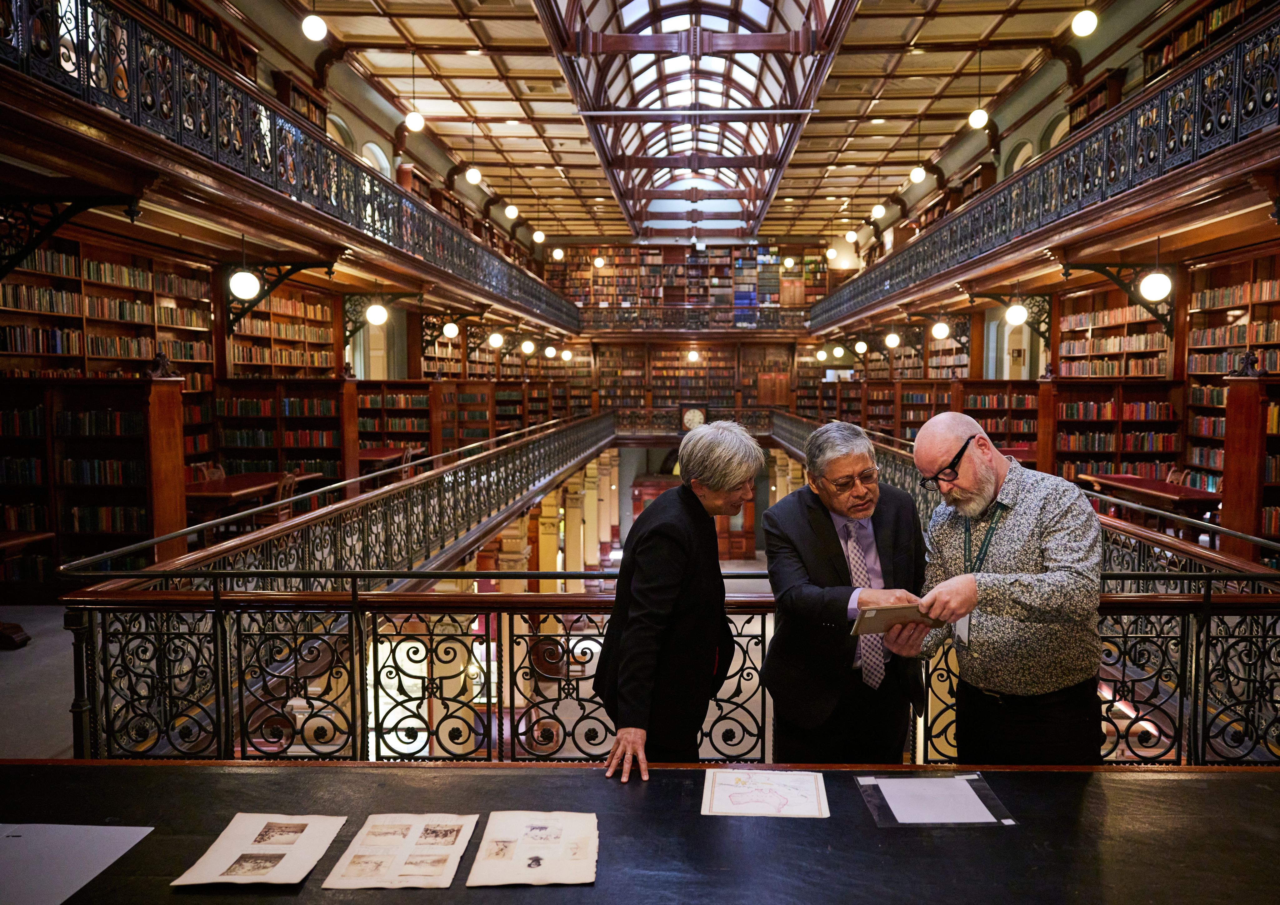 Foreign Minister Penny Wong and Philippine Secretary for Foreign Affairs Enrique Manalo visiting the State Library's Mortlock Chamber.