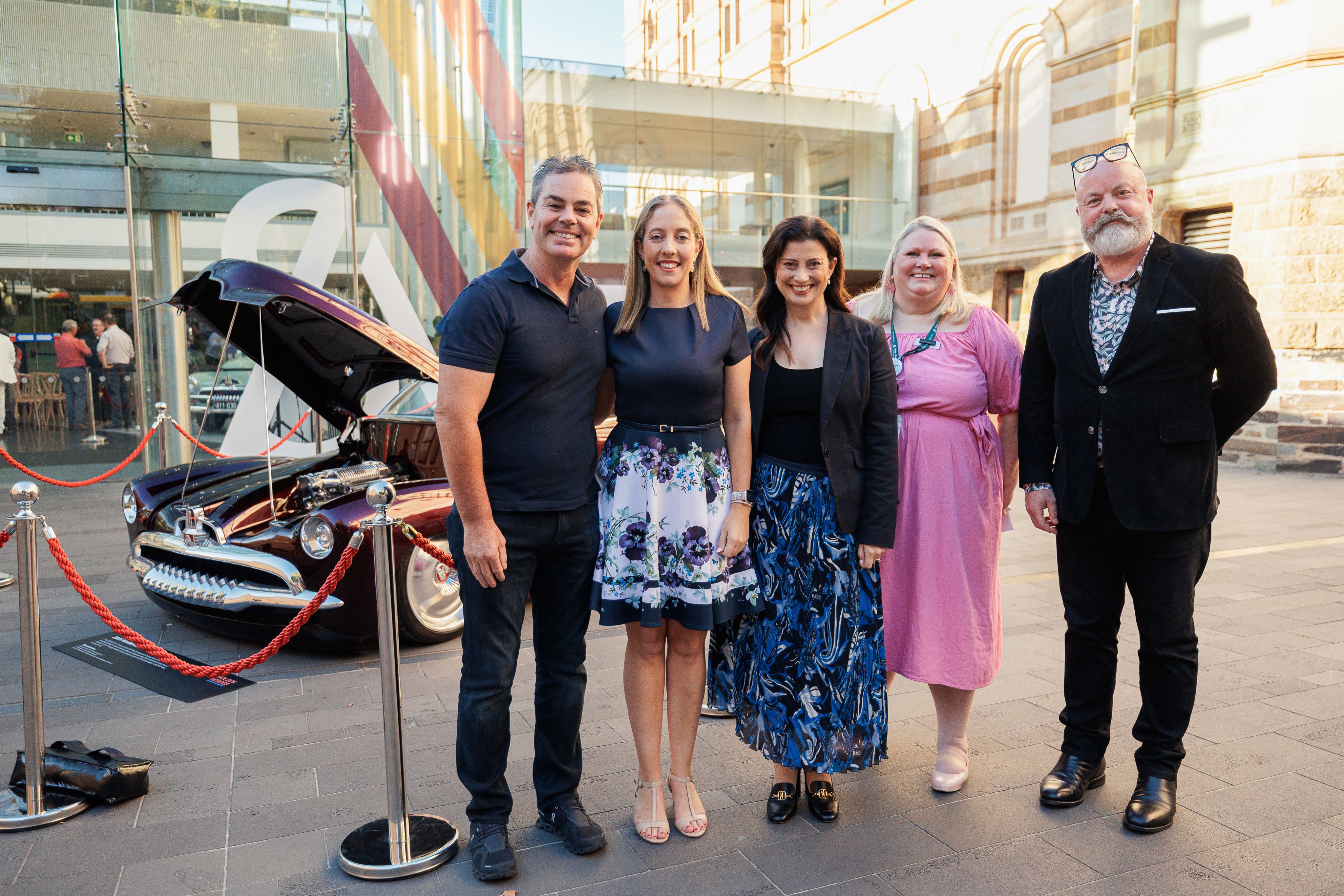 Rear Vision launch event with GM Australia Ambassador Craig Lowndes, GM Australia Managing Director Jess Bala, The Hon Andrea Michaels MP Minister for Arts, State Library Director Megan Berghuis and Exhibition Curator Mark Gilbert.