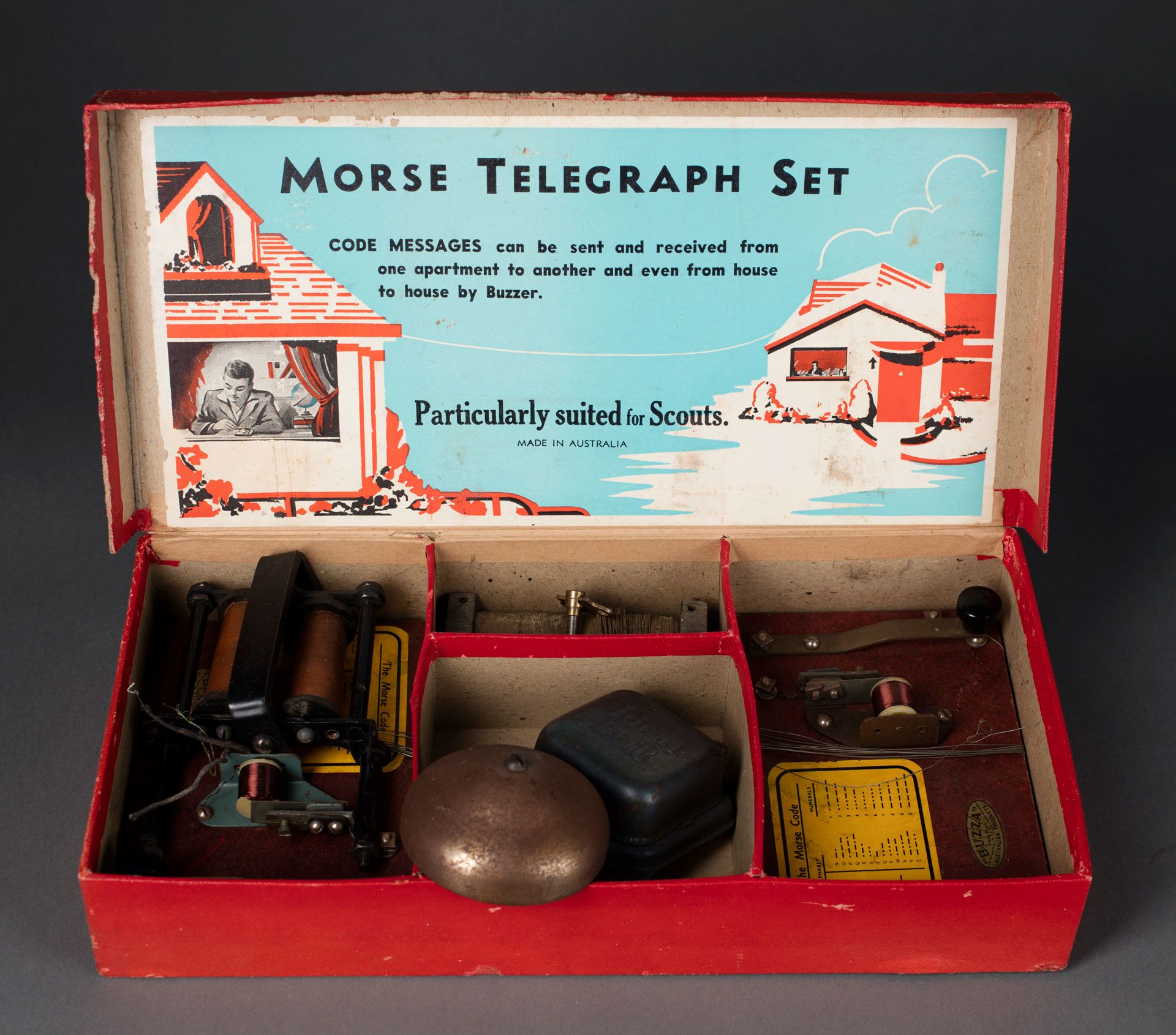 A Cold War toy: Morse Telegraph Set manufactured by Buzza Products, [1956], a Sydney company owned by German-born brothers August ('Gus') Kraus and his brother Victor. SLSA: CLRC Box no. 133