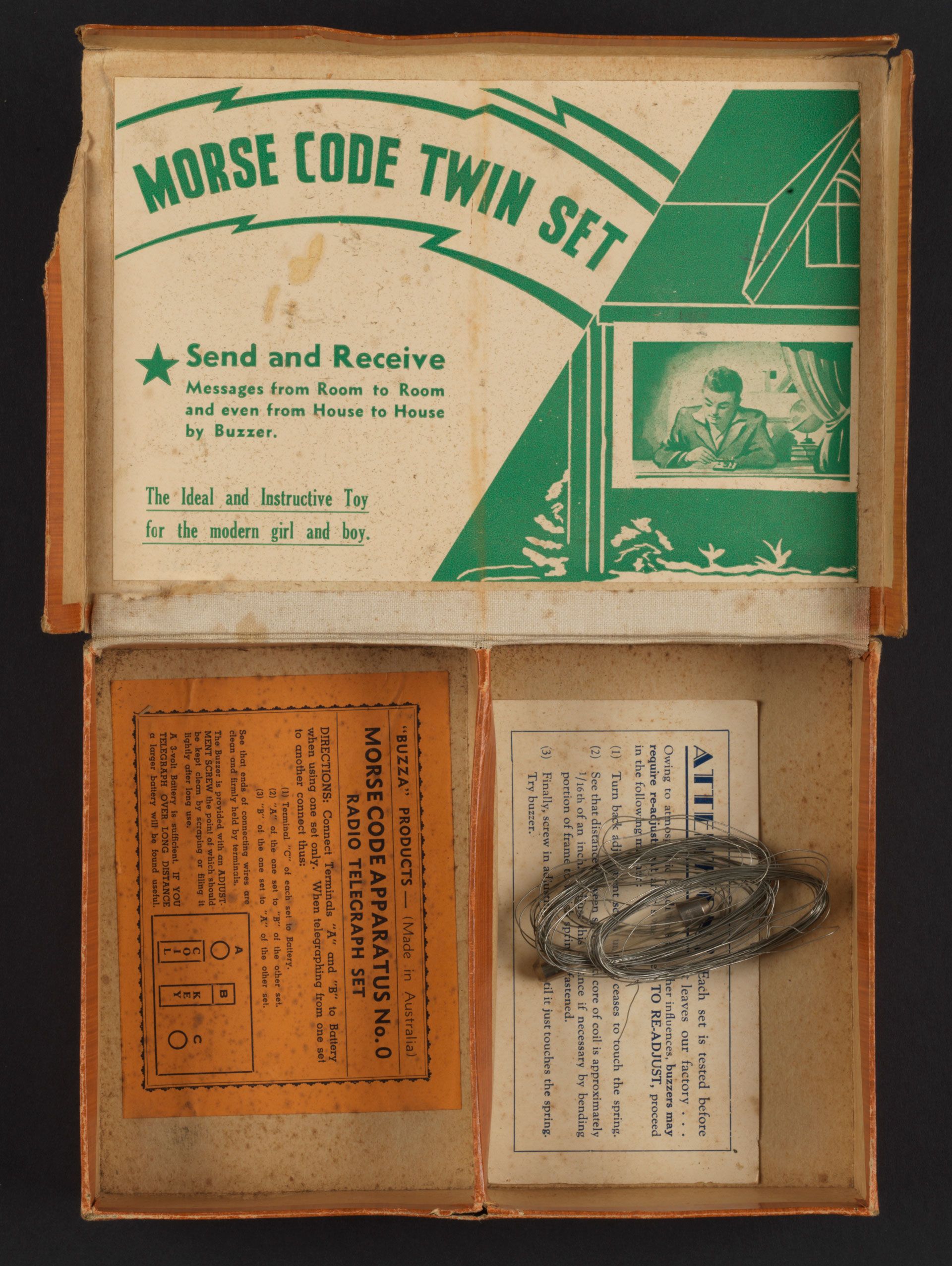 Also by Buzza Products, a Morse Code Twin Set., 1940s, Buzza Products, SLSA: CLRC Games Box 42. The box is worn and many of the components are missing which indicates the hard use this set was put to.