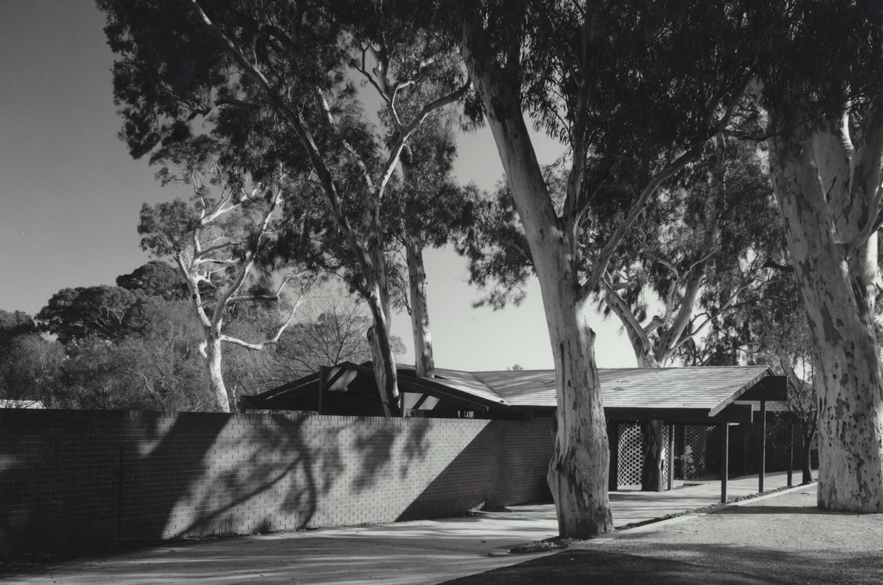 This caption was written by John S. Chappel: 'The "entrance front" from Philip Avenue. Without windows, this façade is restrained and anonymous, but emphasizes the integration of house and site'. SLSA: BRG 346/29/24/1