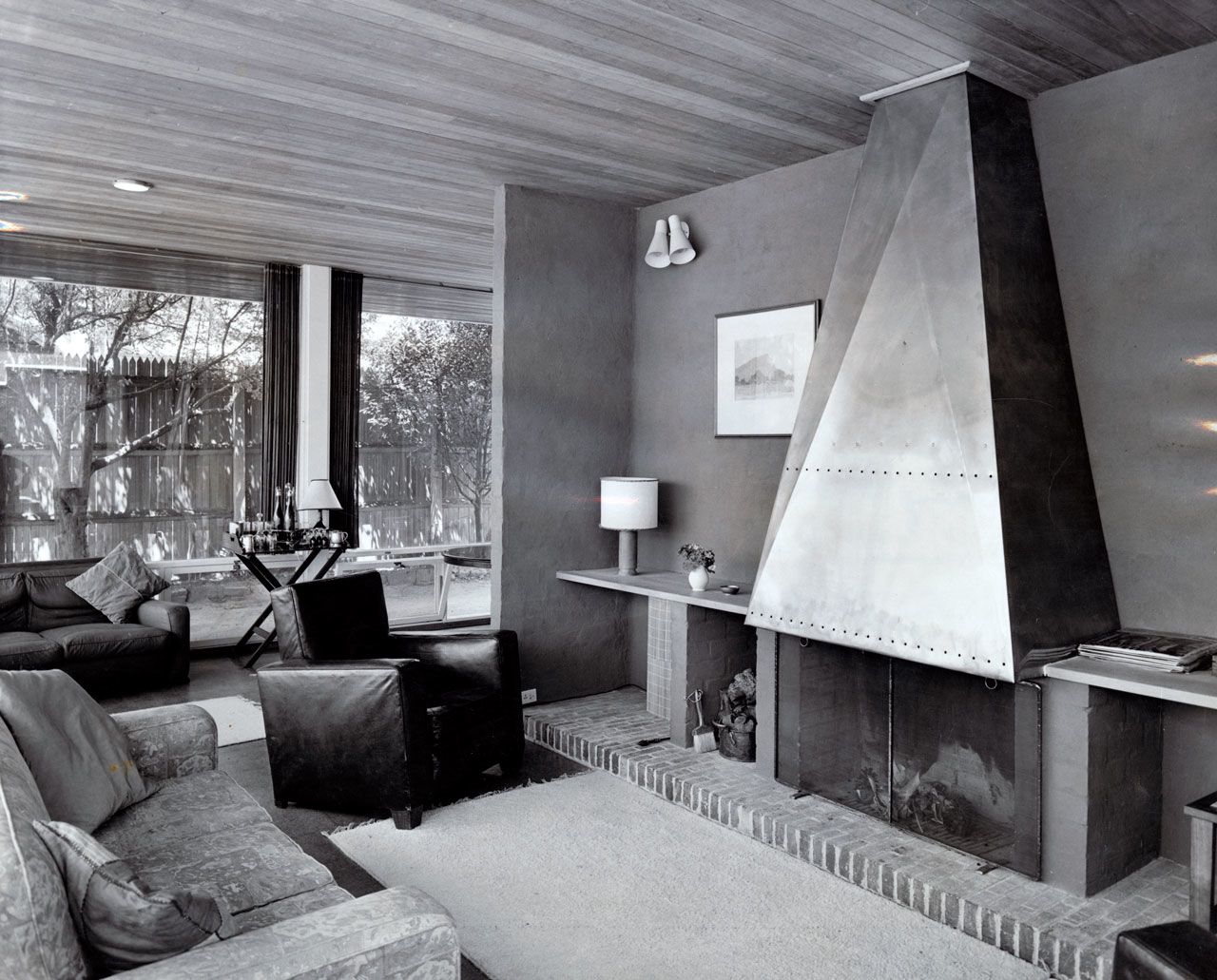 Interior view of the house at Palmer Place, North Adelaide featuring the living room and view into the side garden of the home, November 1959. Architect, Robin Boyd. SLSA: BRG 346/28/WalkleyandWelbourne/2/1
