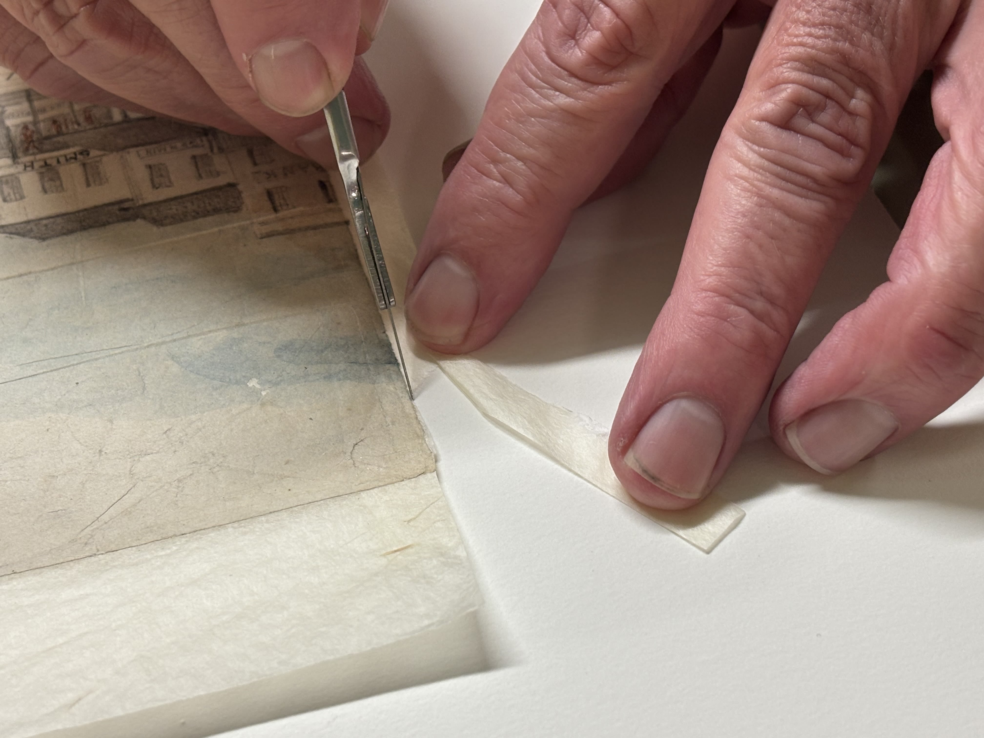 Trimming the Japanese tissue paper.