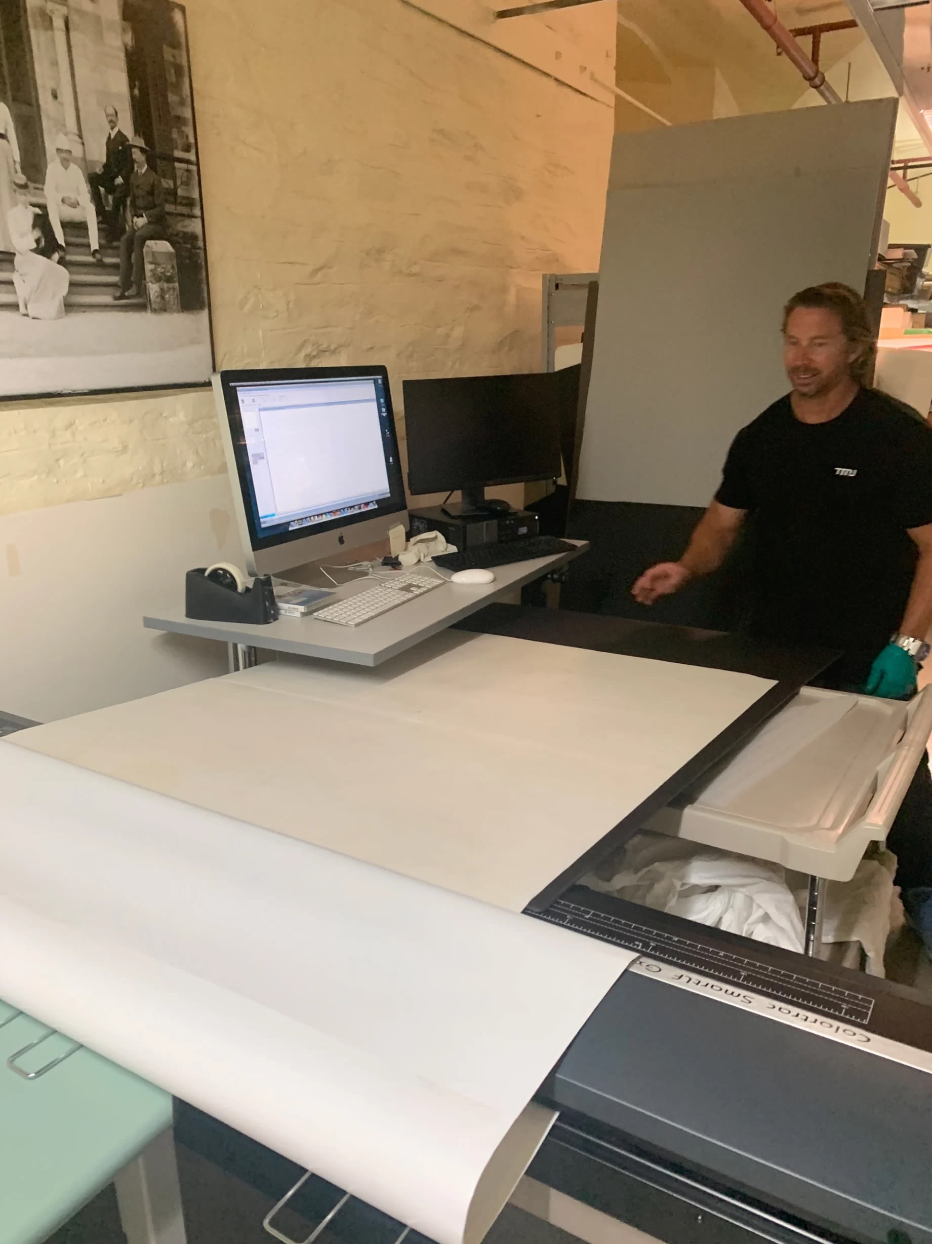Toby Woolley positioning the equipment to digitise the Port Gawler map. Photograph: SLSA: February 2023