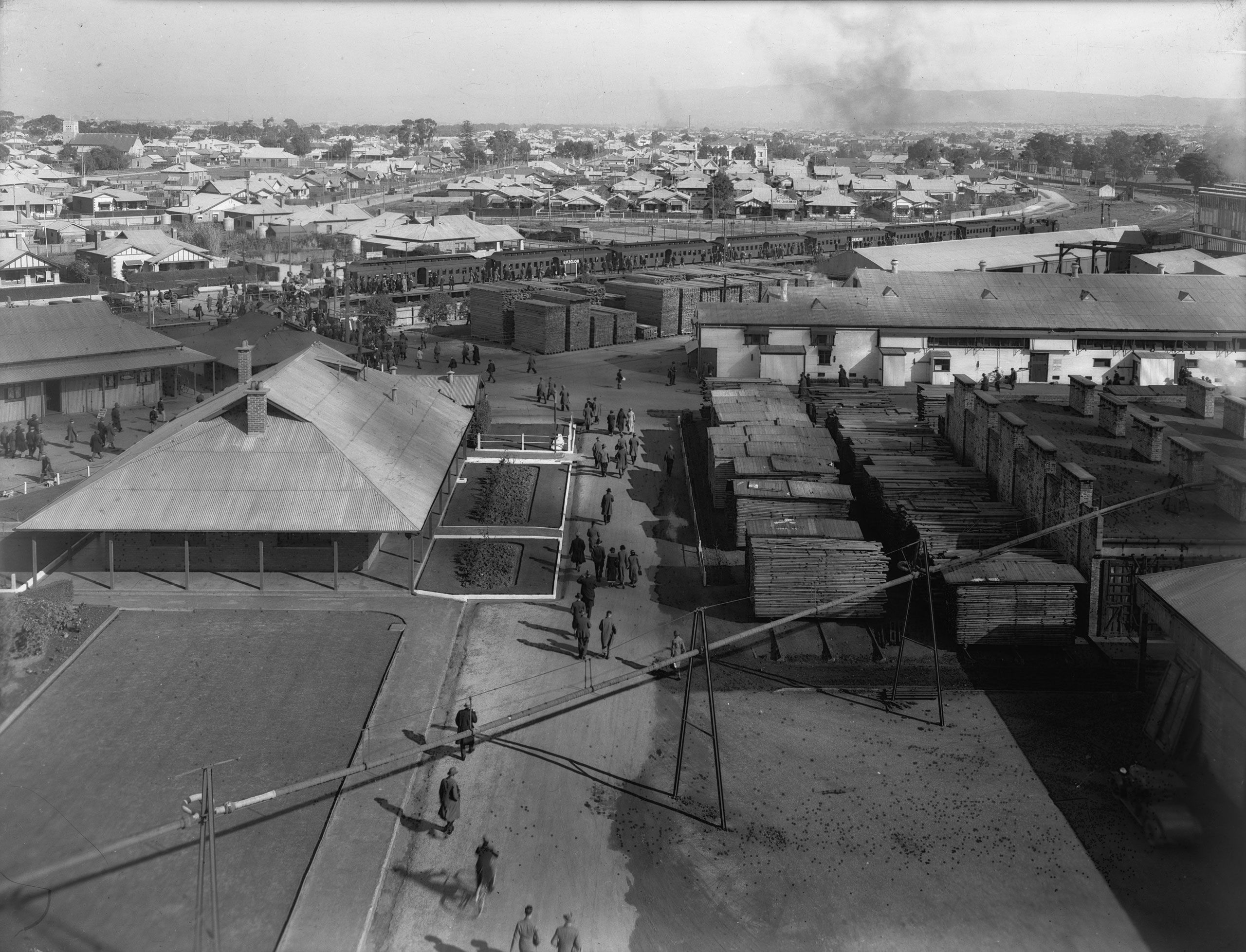 ‘When the five o’clock whistle blows’, 1929. Shows employees going to catch trains at Holden’s private railway station that adjoined the Woodville plant. Photographer D Darian Smith. SLSA: BRG 397/7/366