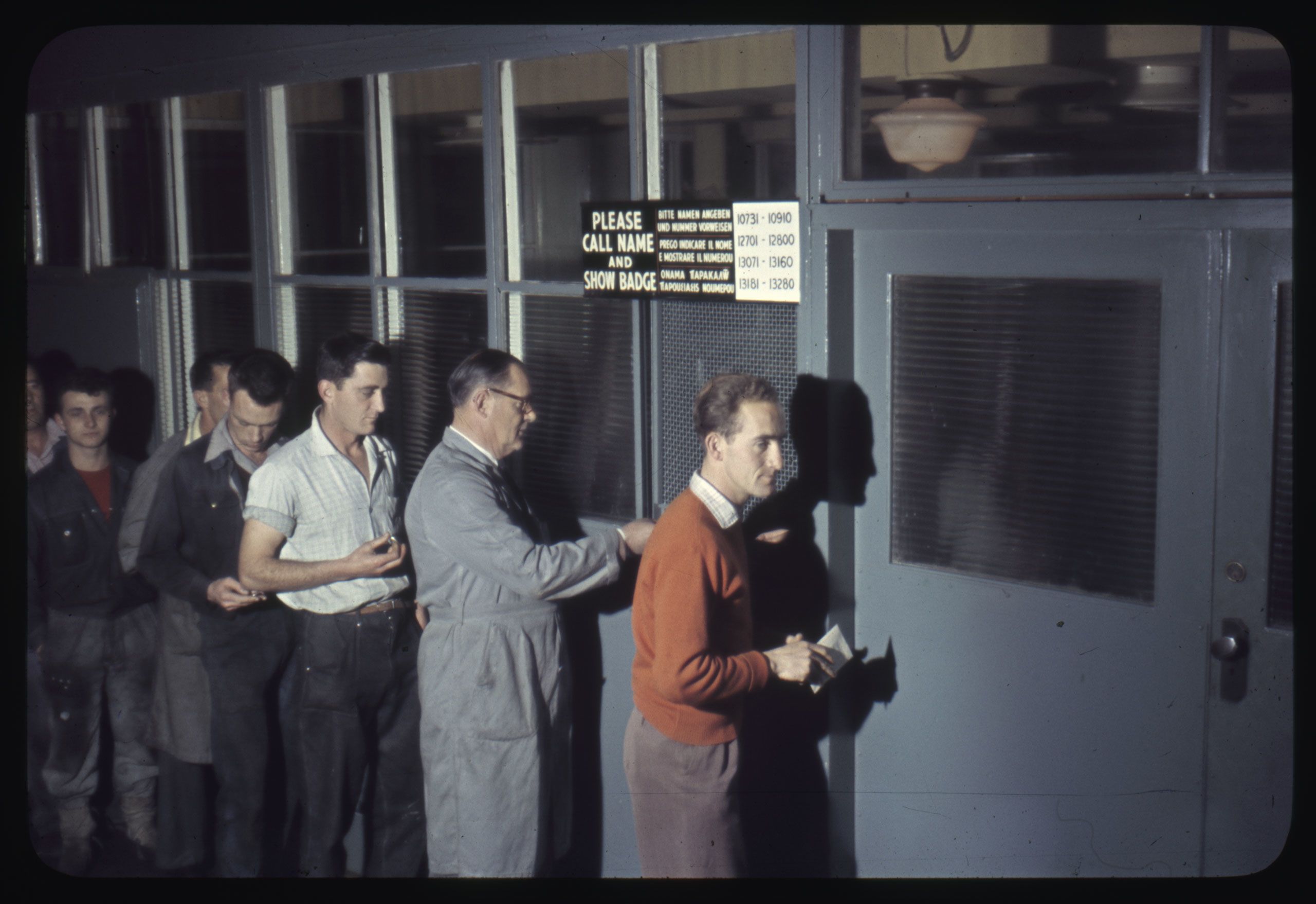 Woodville pay office, with English, German, Italian and Greek languages on the sign, c1964. SLSA: BRG 213/77/84/723 