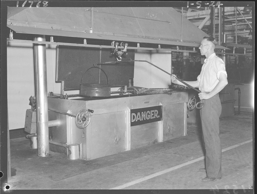 Working on torpedoes, 14 February, 1944. D Darian Smith, photographer. SLSA: BRG 213/207/4/2077