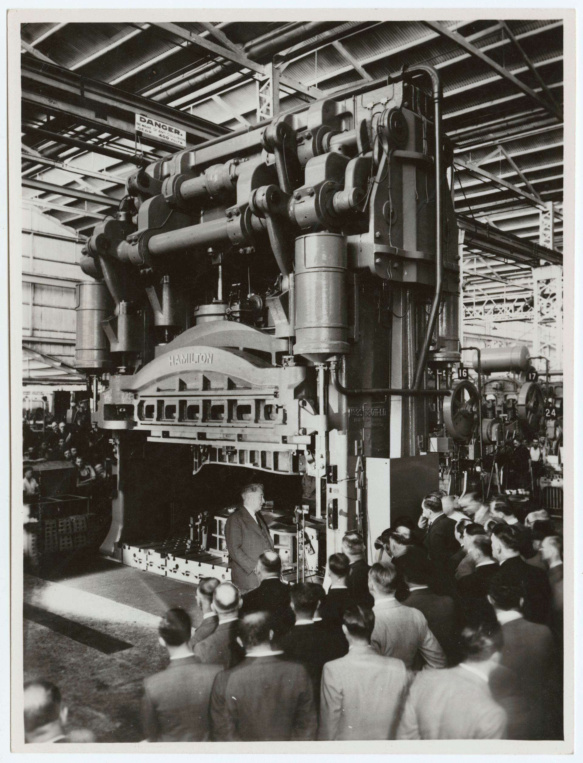 The Prime Minister, J. Lyons, starting the new Hamilton Press in the Woodville Press Shop, 15 December 1938. SLSA: BRG 213/77/52/43 