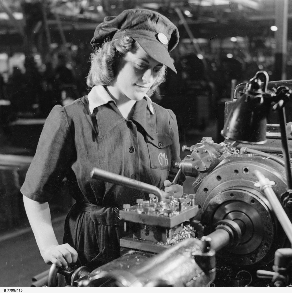 Cutting driving bands for anti-aircraft shells, 1942. Photographer D Darian Smith. SLSA: B 7798/415